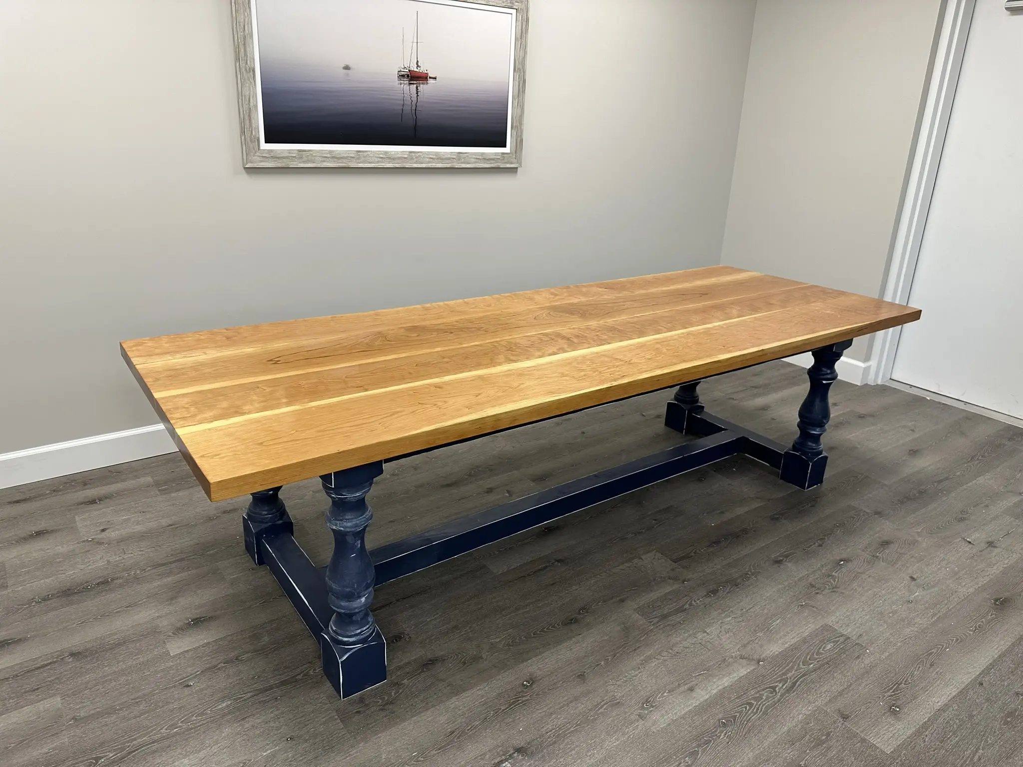 The Sebastian Inlet Monastery Leg Solid Wood Dining Table 9 feet Long in Solid Cherry Top and Natural Finish