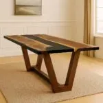 A bold, modern silhouette with a distinctive V-leg base, the Aventura Table combines sleek geometry with natural live-edge charm.