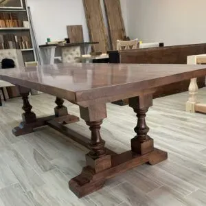 A grand statement piece with timeless elegance, The Oyster Hill Table features handcrafted pedestal legs and a rich, satin-smooth finish that anchors any dining space in classic Southern charm.